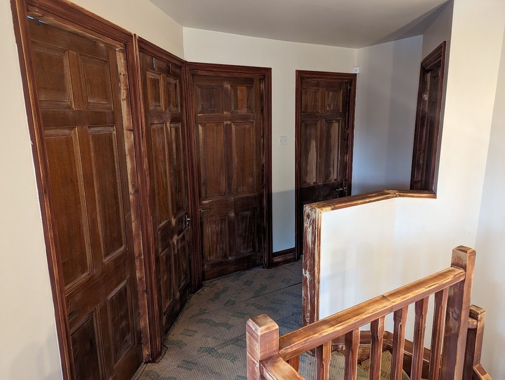 Landing walls prepared for finishing coats