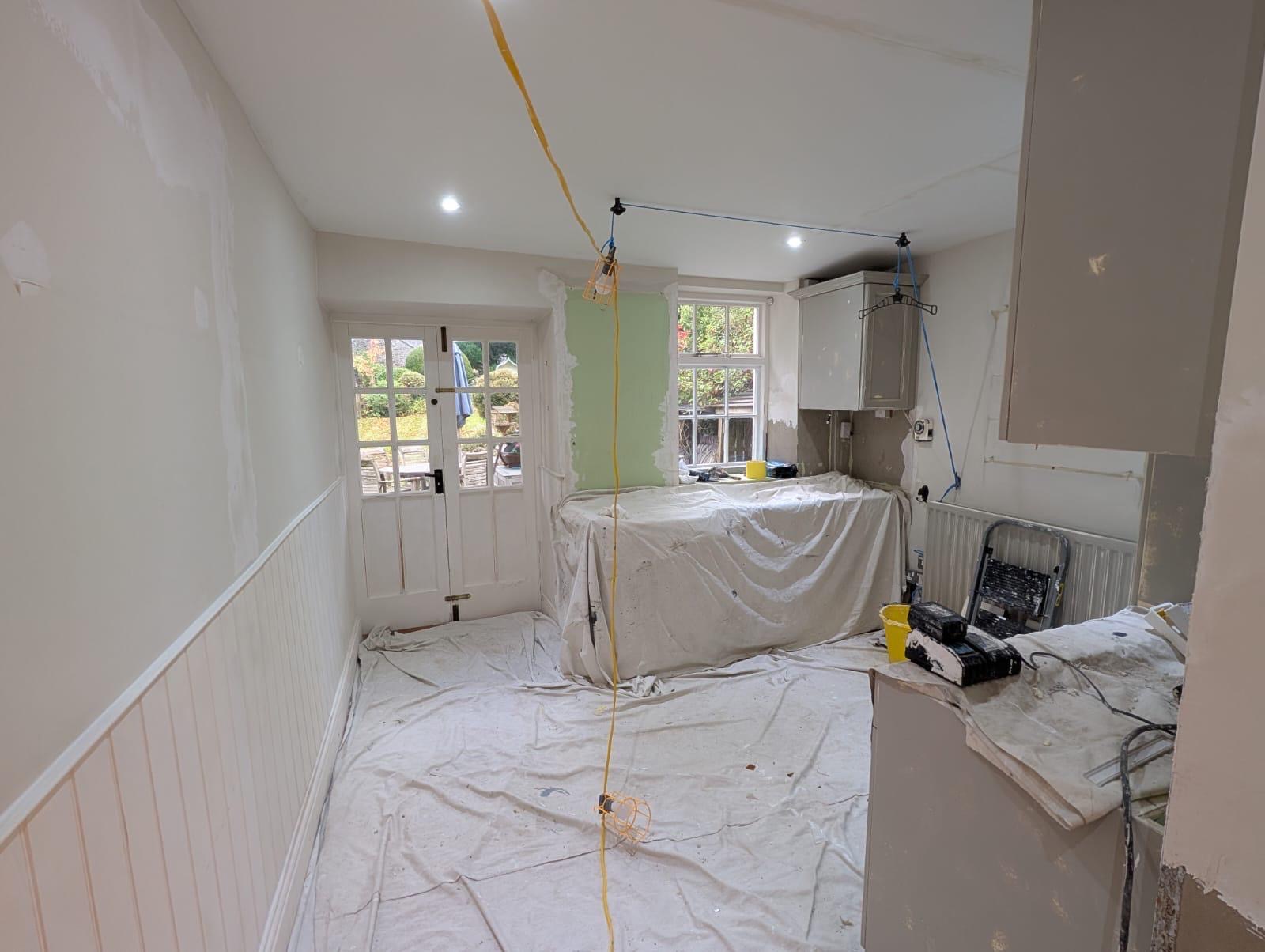 Finished WC with designer wallpaper and painted woodwork