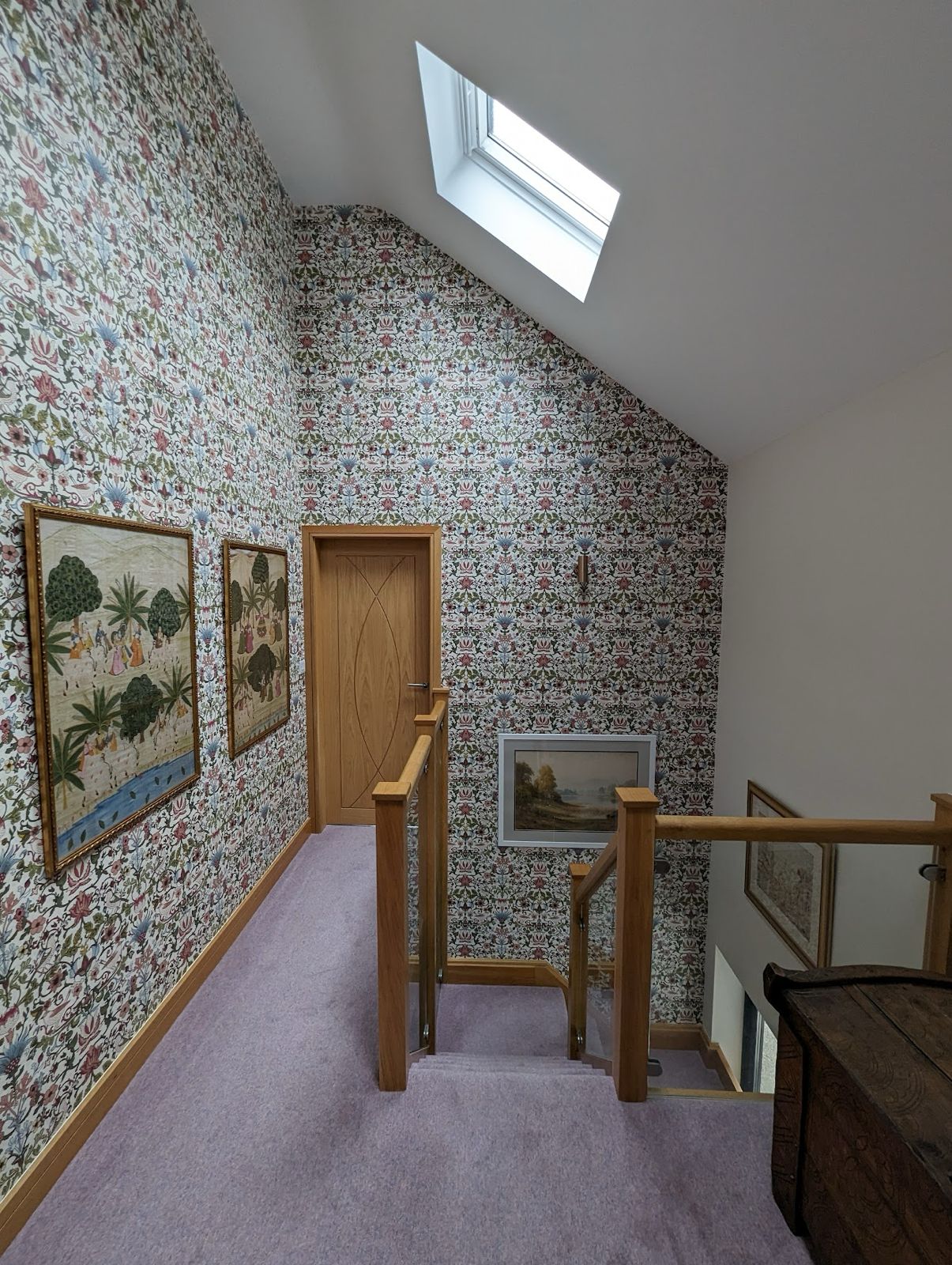 Wallpapered stairwell in Windermere by RENOV8 Northwest