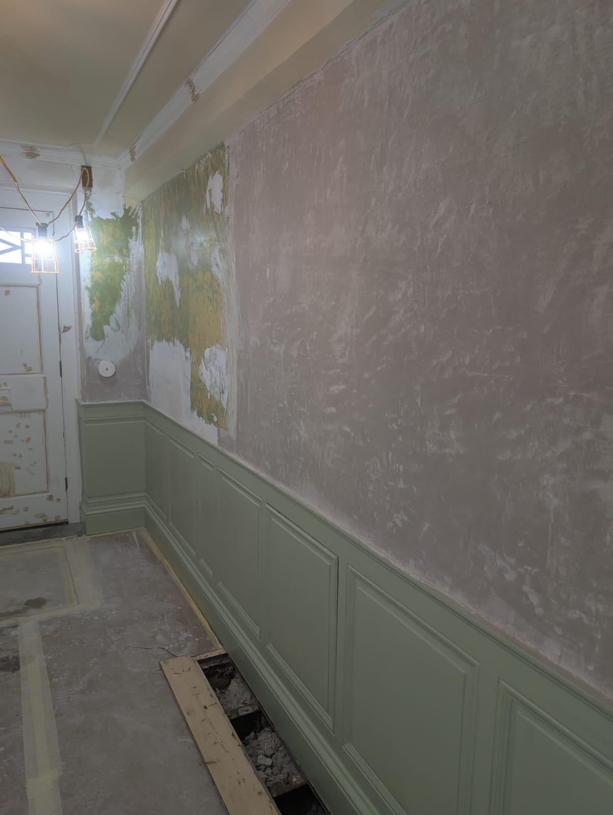 Utility room tiles removed and walls made good