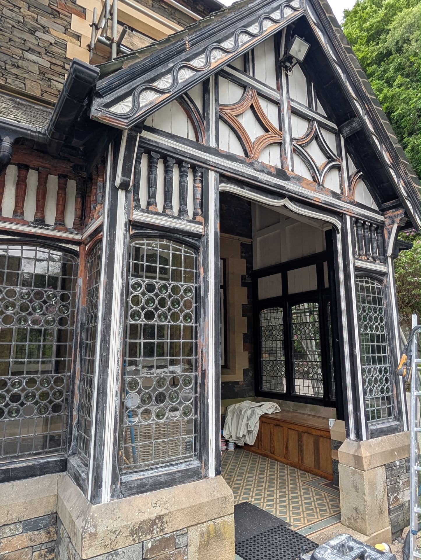Ornate Troutbeck timber porch before restoration